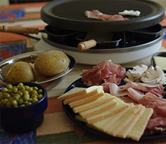 Raclette verticale à la braise - La Forge De Megeve