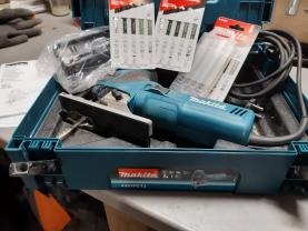 Location : scie sauteuse Location : scie sauteuse