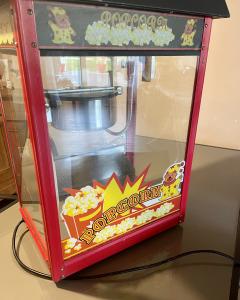 Location : machine a pop corn Location : machine a pop corn